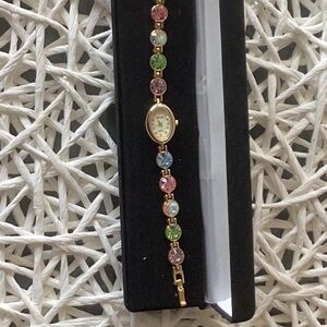 Persona Gold-Tone Bracelet Watch with Pink and Blue Crystal Accents
